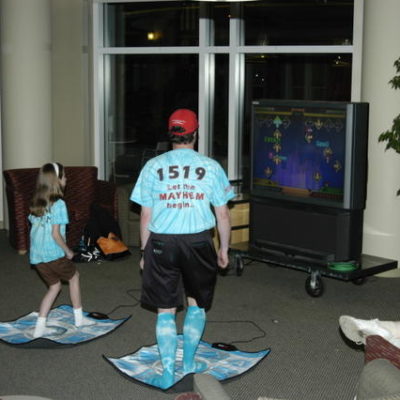 Faith S. and Coach Streeter playing DDR at the Friday night social.