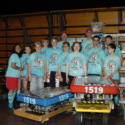 The drive teams and pit crew with both robots.