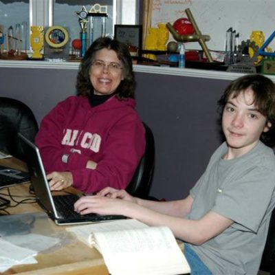 Mrs. Gray and Jackson learning the software.
