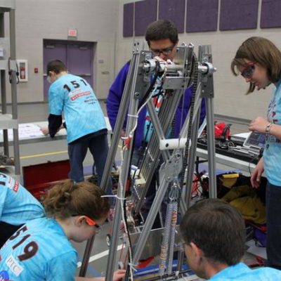 Busily preparing the robot for competition.