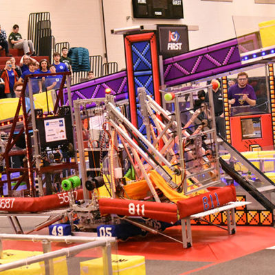 Team 4905 lifts their alliance partners, attaining the first 3-ranking-point match (along with the levitate Power Up earlier in the match)